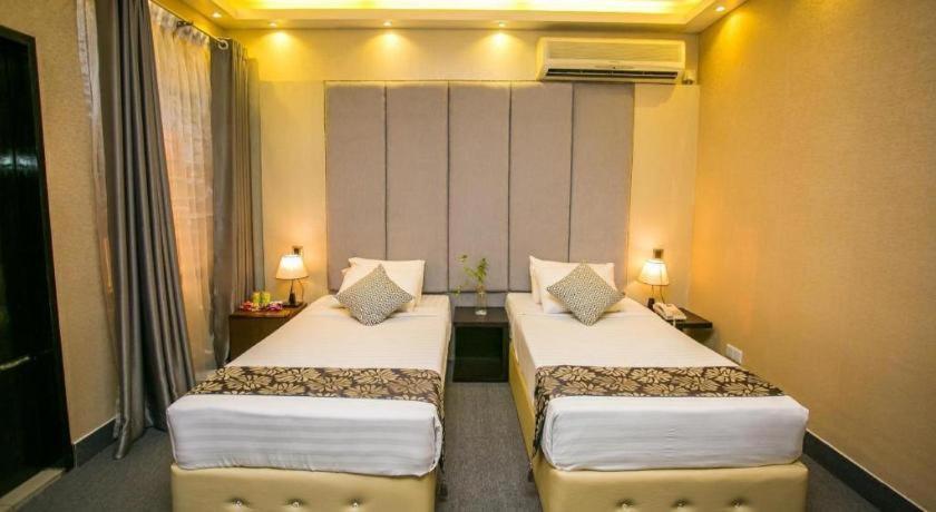Tropical Daisy Hotel Dhaka Buitenkant foto